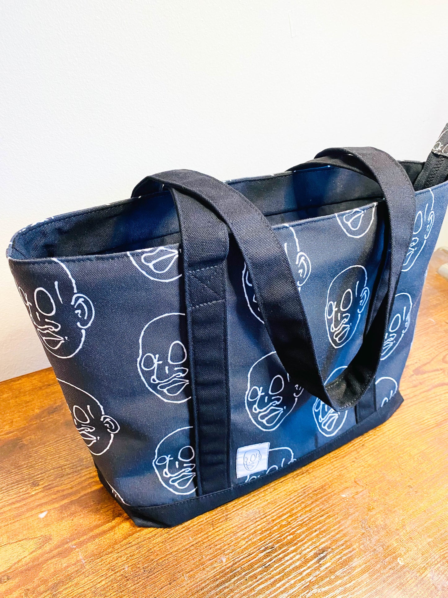 Black and White Zippered Tote Bag with Blue Lining